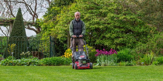 Self propelled petrol mower review: Jon Brocklebank mowing lawn with Mountfield SP185 rotary lawn mower