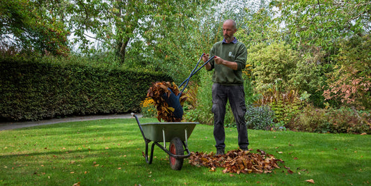 Jon Brocklebank collecting leaves at Barnsdale Gardens using the Spear & Jackson Leaf Grabbers