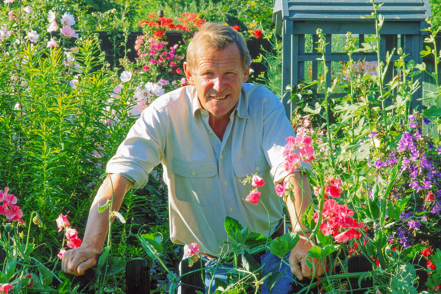 DVDs by Geoff Hamilton. Geoff Hamilton standing in The Artisan's Cottage Garden at Barnsdale Gardens