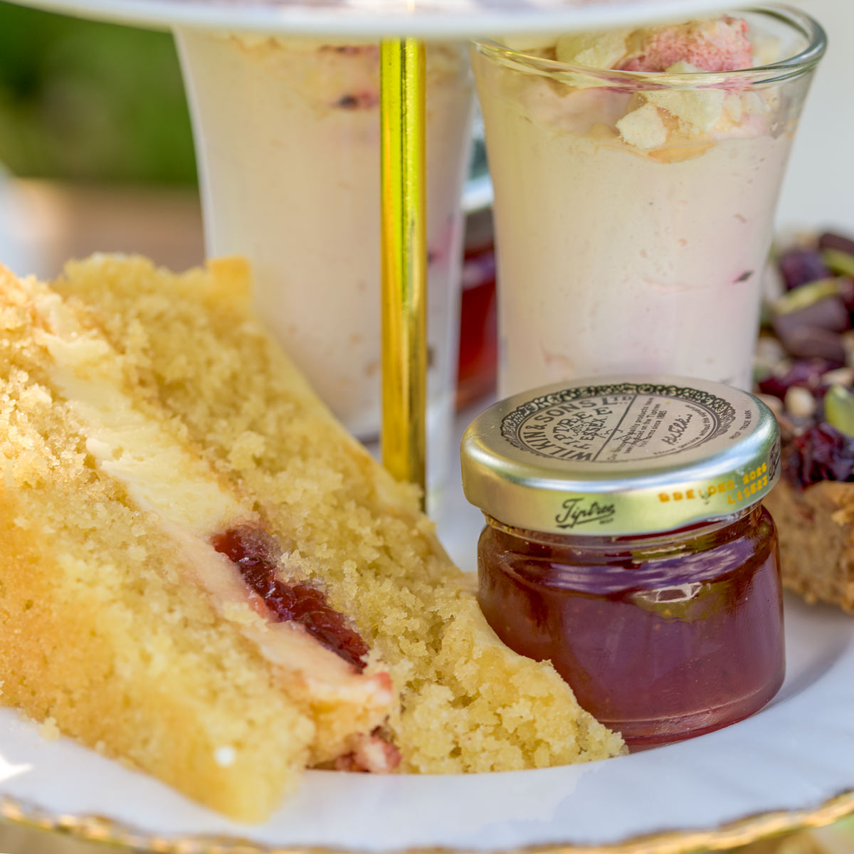 Barnsdale Afternoon Tea: close up of cake, pot of jam and Eton Mess pots.