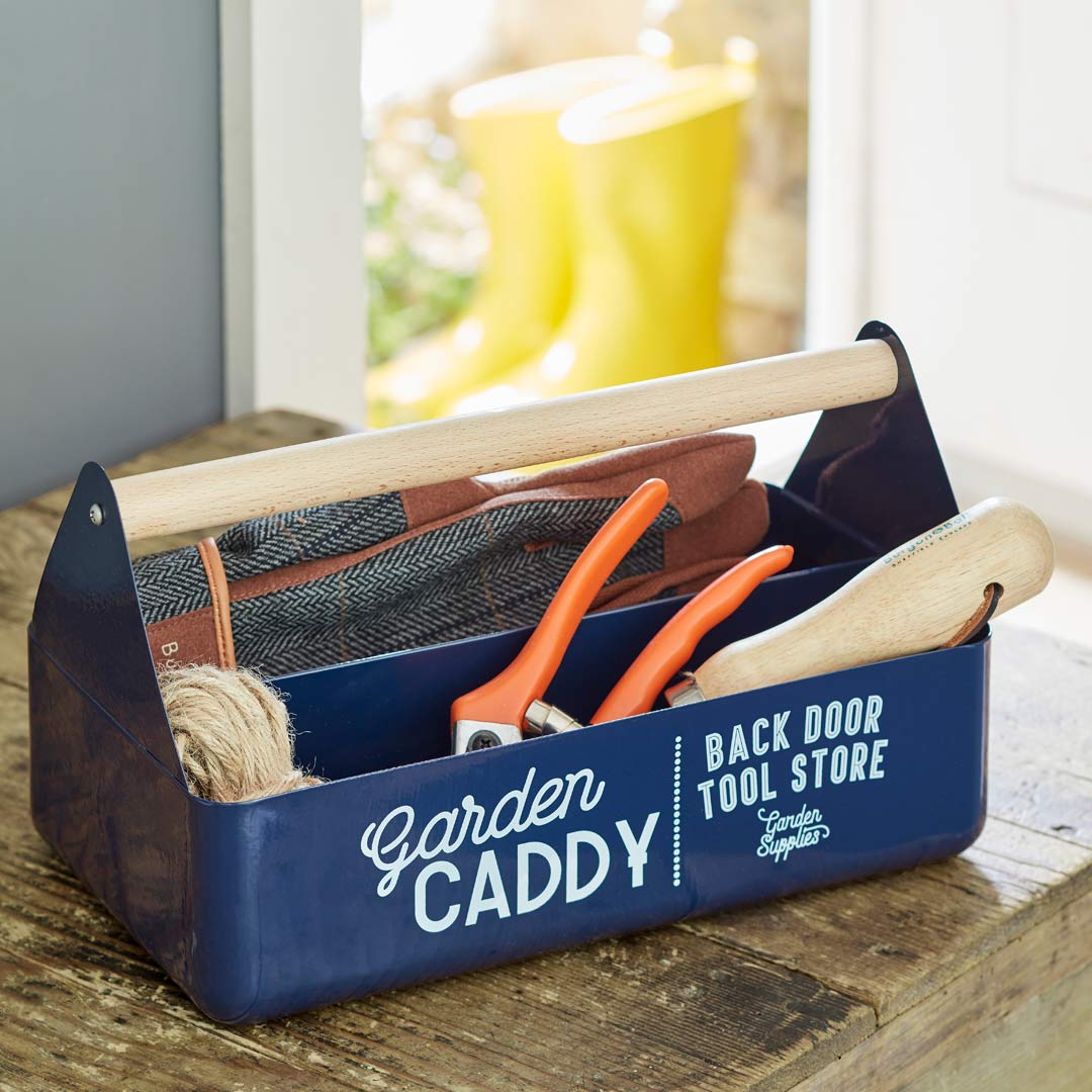 Garden Caddy in Atlantic blue colour, holding garden tools and accessories.