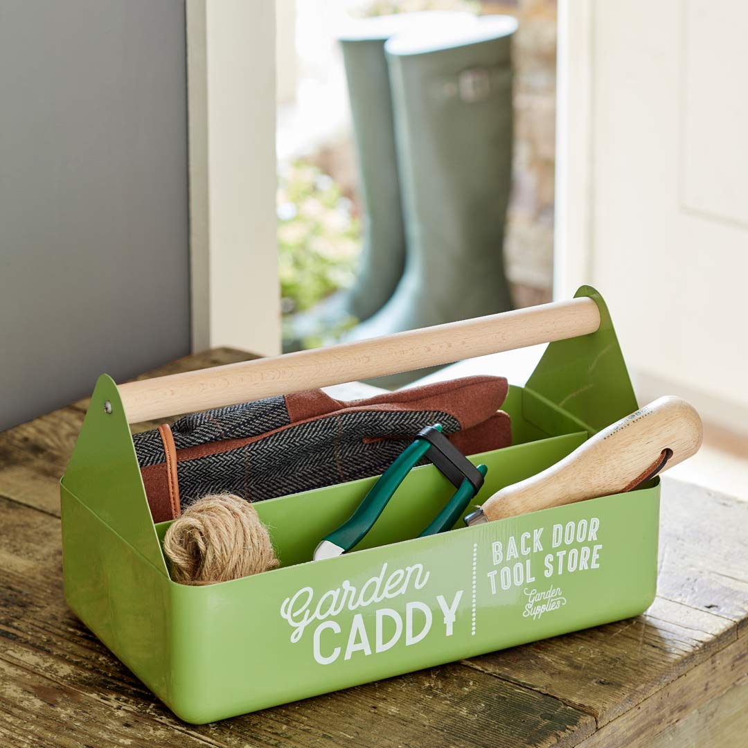 Garden Caddy in gooseberry green colour, holding garden tools and accessories.