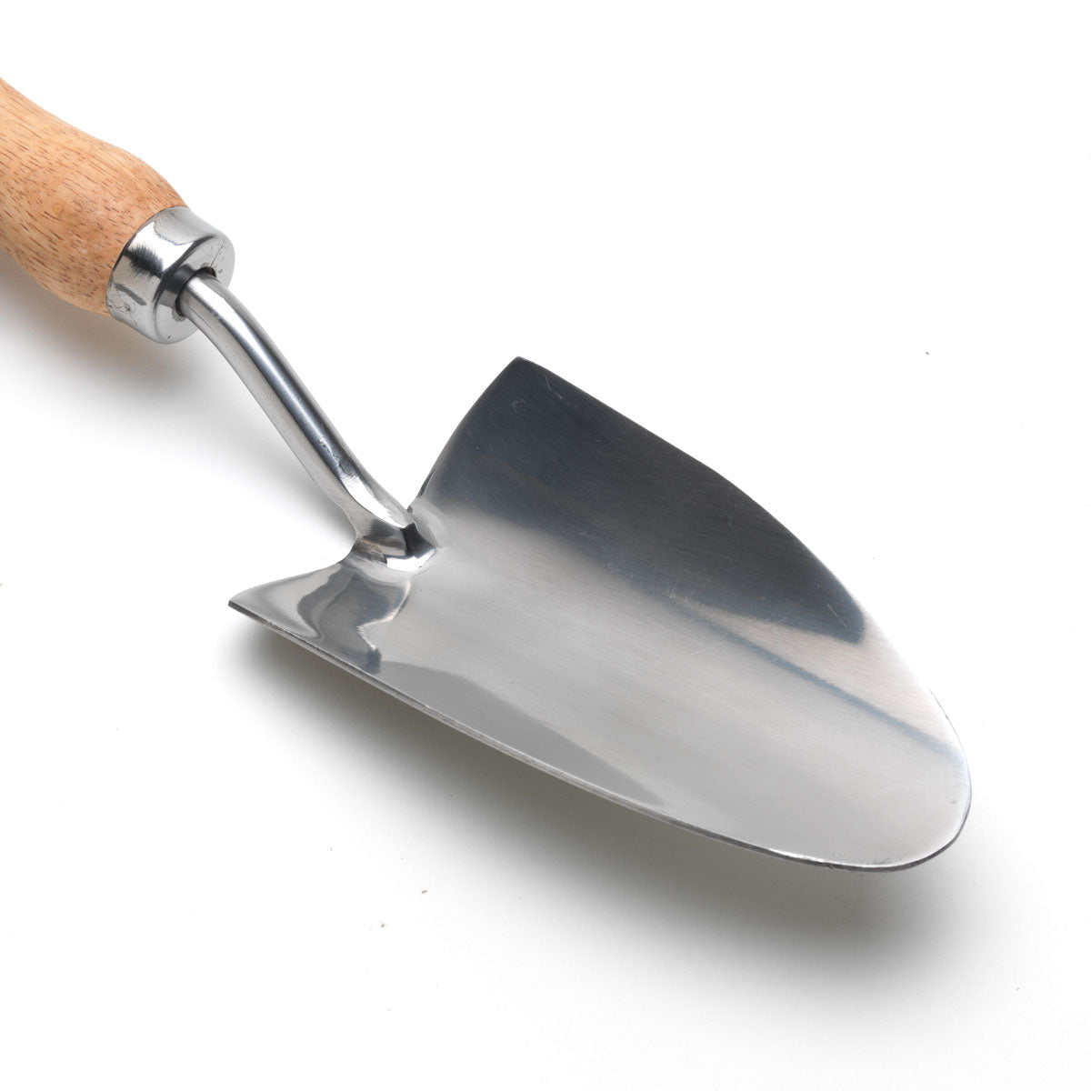 Close up of stainless steel garden hand trowel, with wooden handle, from Burgon & Ball.